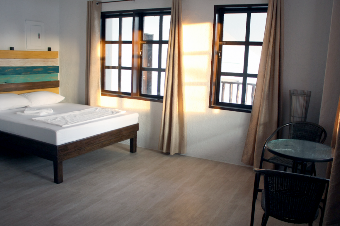 SentroSuitesSiargao_Room2-04_Bed_IMG_0048